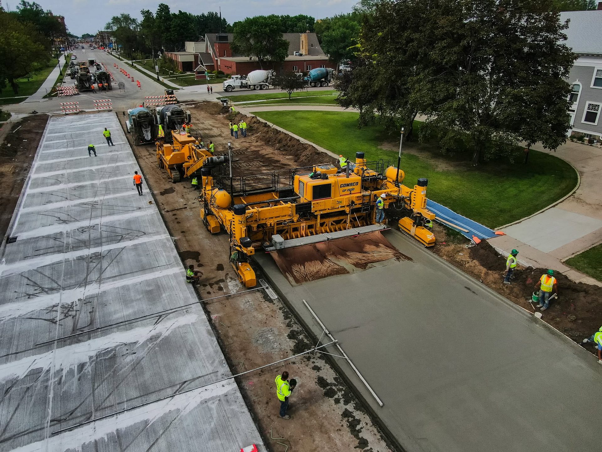 Aerial view of a slipform paver on a street paving project