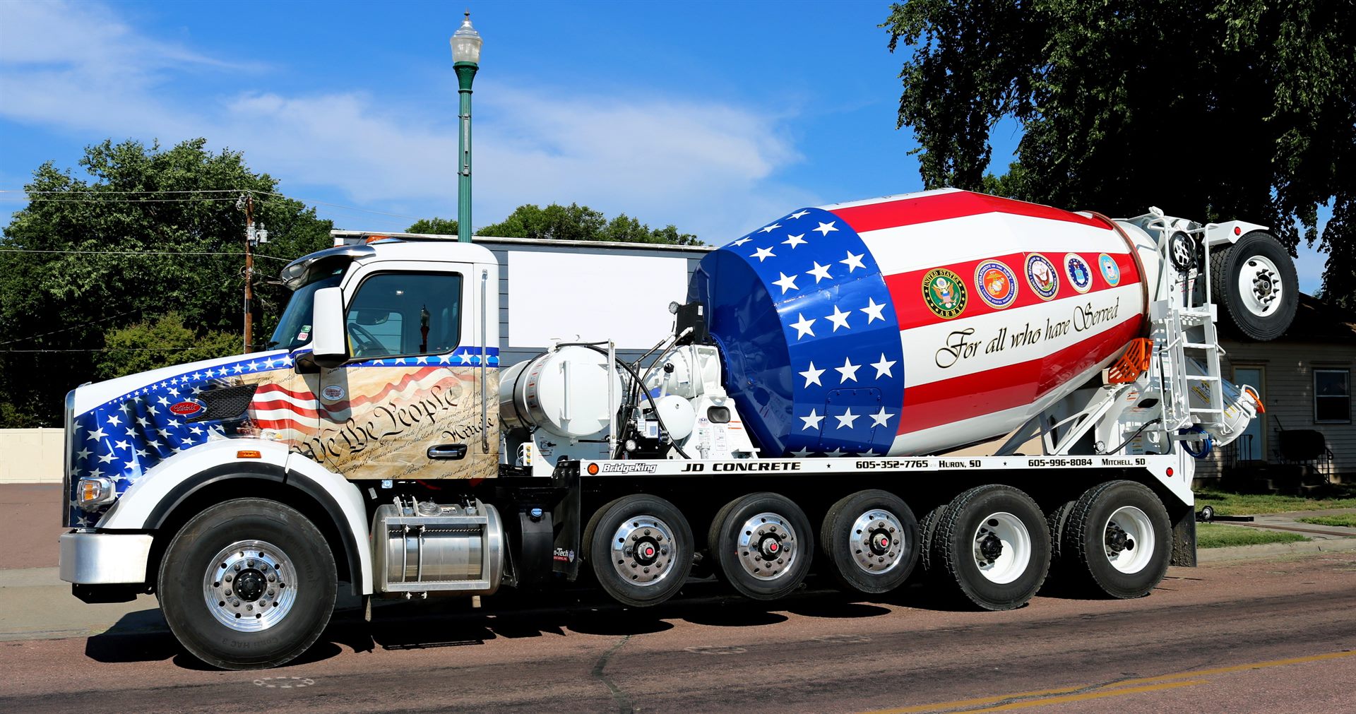 JD Concrete ready mix truck with the For All Who Have Served mixer wrap